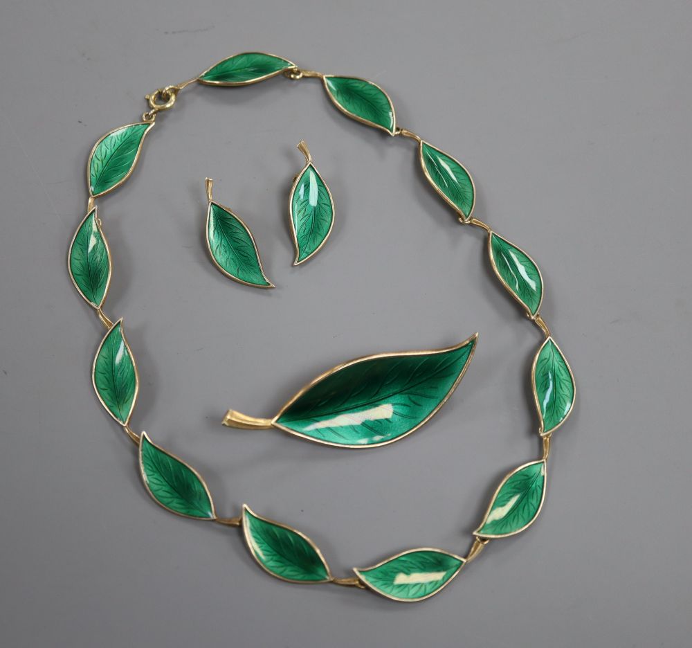 A suite of Danish gilt 925 sterling and green enamel jewellery